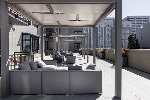 Rooftop seating and lounge area at Rasa Apartments